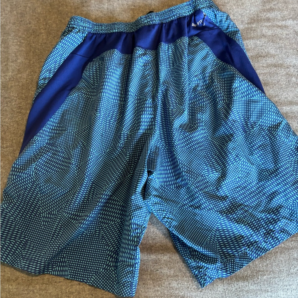 Nike men’s unlined drifit running shorts. Size M